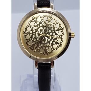 Francesca's 1494 women's dress watch. Ornate gold design on watch face